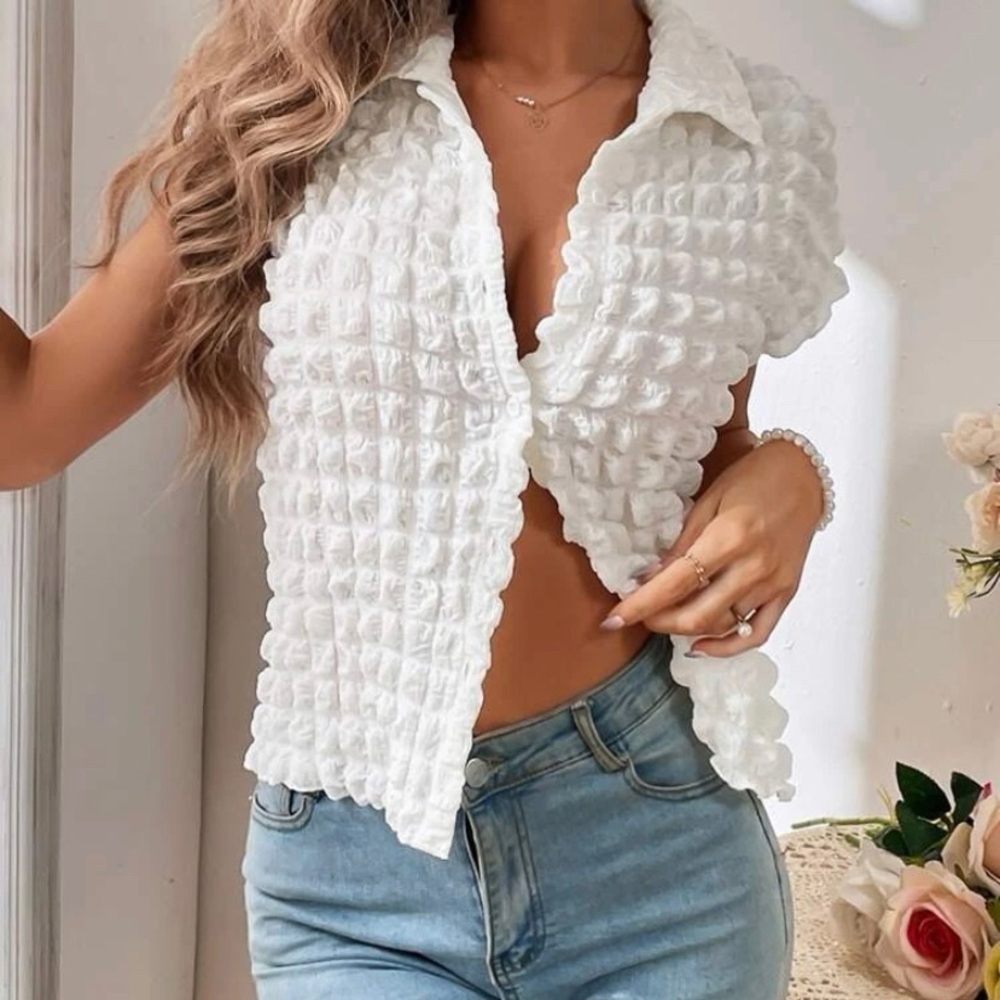 Batwing sleeve texture shirt.